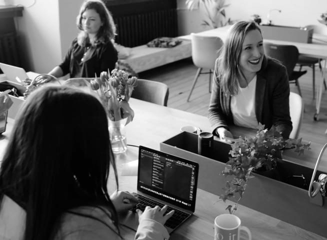 People working in an open space office